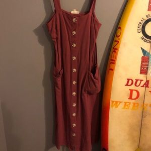 Long red button up dress with tie